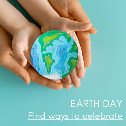 Adult and child hands holding an image of earth
